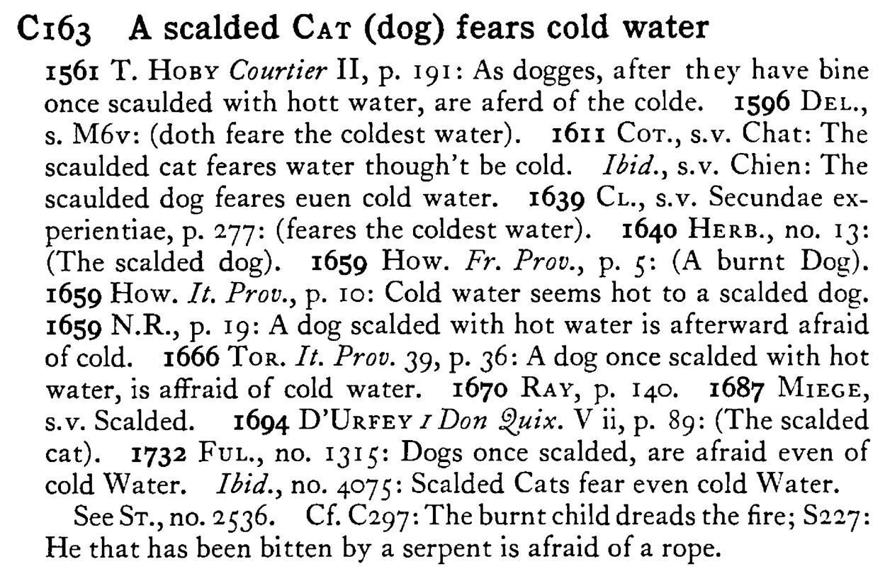 A scalded CAT (dog) fears cold water - a scanned entry from Tilley's 1950 Dictionary of Proverbs.