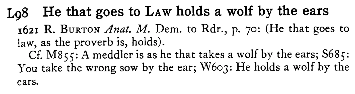 He that goes to LAW holds a wolf by the ears - a scanned entry from Tilley's 1950 Dictionary of Proverbs.