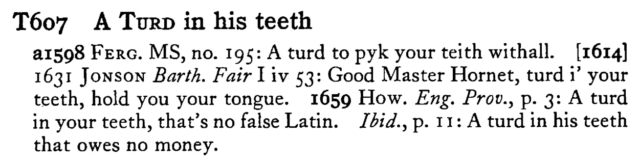 A TURD in his teeth - a scanned entry from Tilley's 1950 Dictionary of Proverbs.