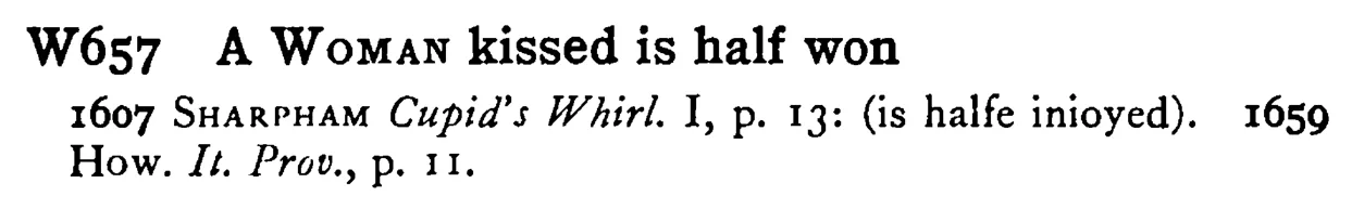 A WOMAN kissed is half won - a scanned entry from Tilley's 1950 Dictionary of Proverbs.